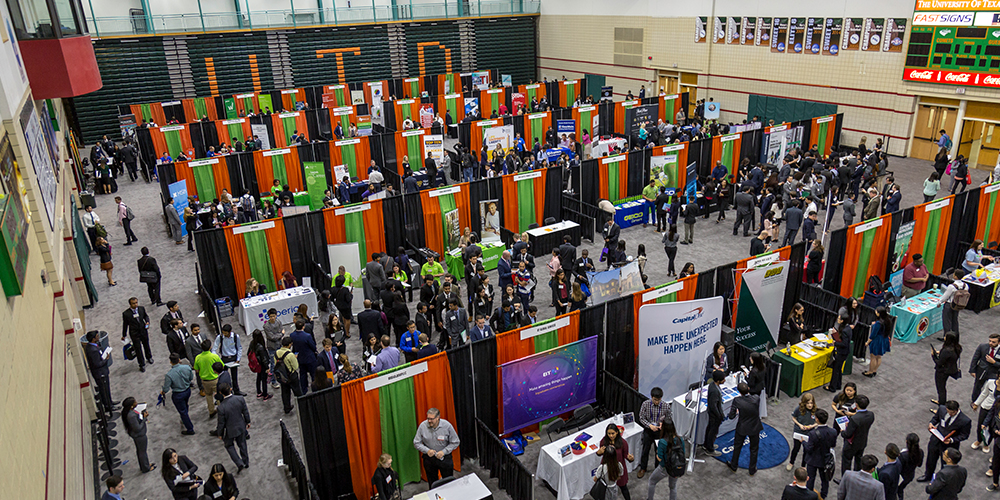 Students fill the main gym for a career expo.