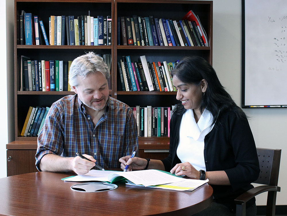 Dr.  Jeffrey Spence and Dr. Asha Vas