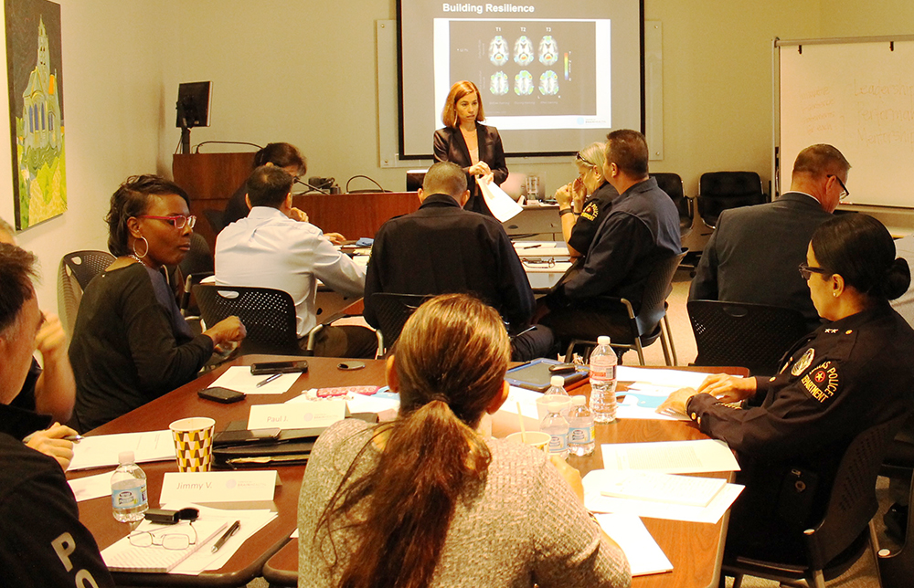 Jennifer Zientz, head of clinical services at the Center for BrainHealth, leads a training session for officers with the Dallas Police Department.   