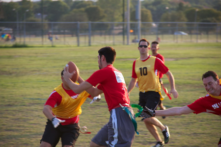 A Player Reaches Out and Grabs the Green Flag