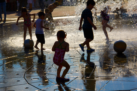 Children Play in the Fountains